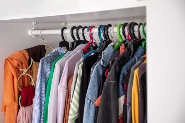 istock Black friday shopping bag with clothes with clothes hanger inside wardrobe , also with mock up space 1733634603