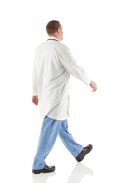istock Profile of a male doctor walking 173363465