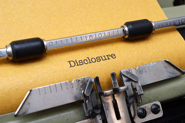 Disclosure text on typewriter stock photo