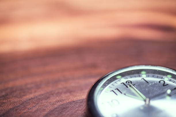 watch on an old wooden table,copyspace