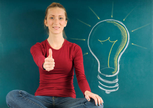 istock Young Woman and Light Bulb Sketch. 173367665