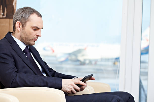 istock Businessman in waiting room 173367740