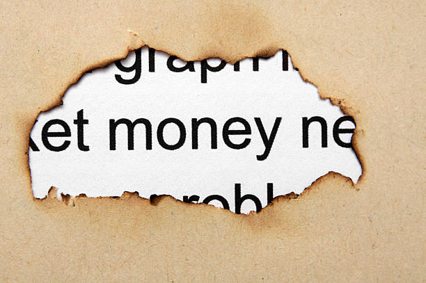 istock Money paper hole 173368107