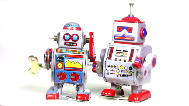 Two retro tin toy robots