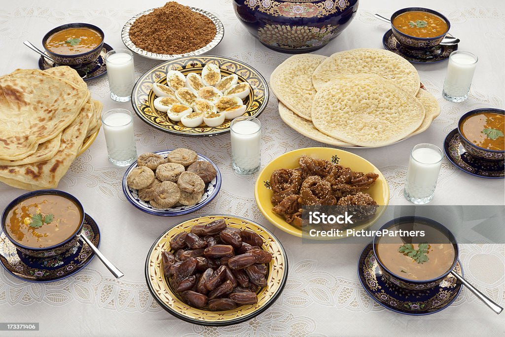 Traditional Moroccan meal for iftar in Ramadan Traditional Moroccan meal for iftar in time of Ramadan after the fast has been broken Soup Stock Photo