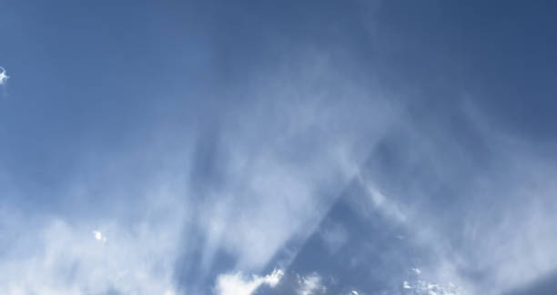 istock Sunbeams in the blue sky 1733747802