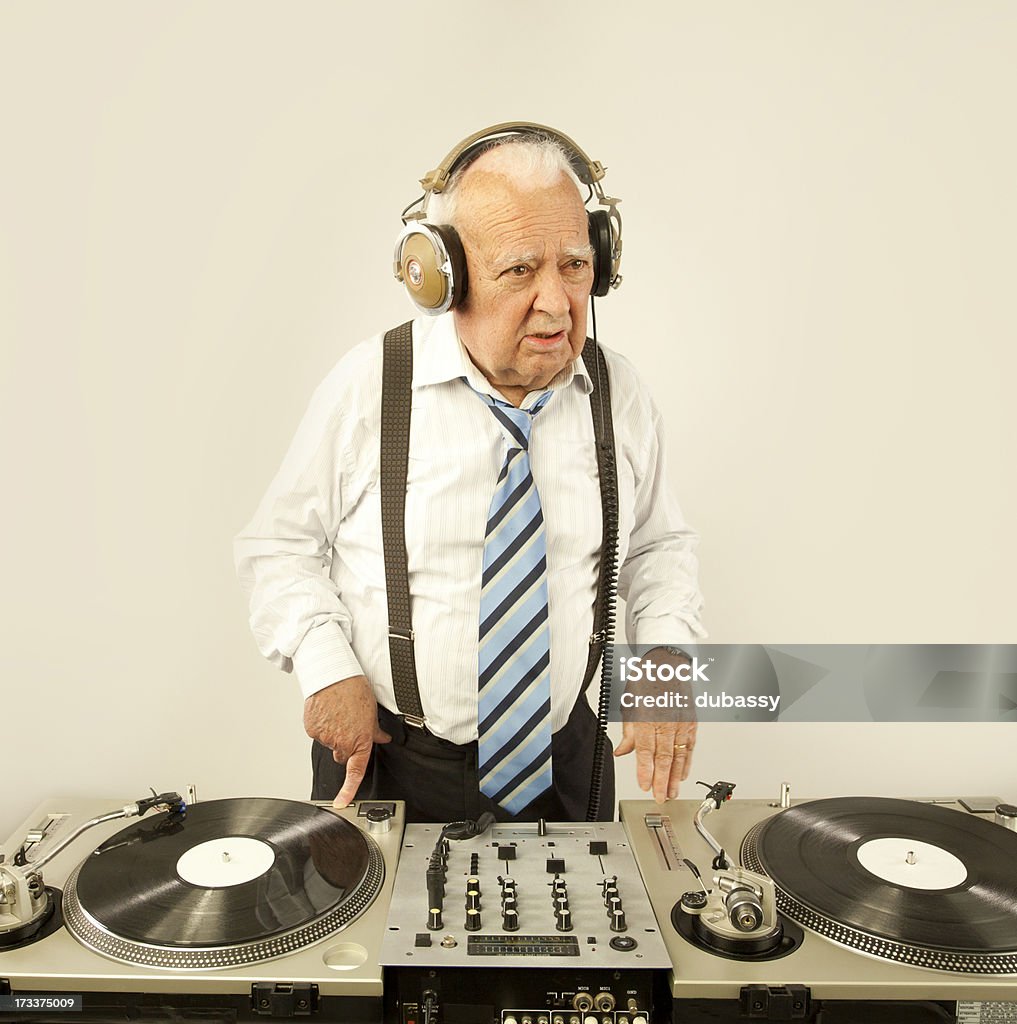 grandpa dj a very funky elderly grandpa dj mixing records Humor Stock Photo