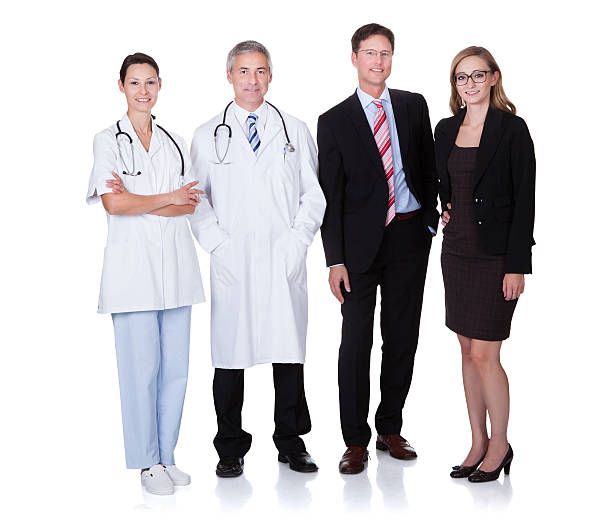 Professional Hospital Staff Hospital staff represented by both the medical profession in the form of a doctor and the business administrators healthcare and medicine business hospital variation stock pictures, royalty-free photos & images