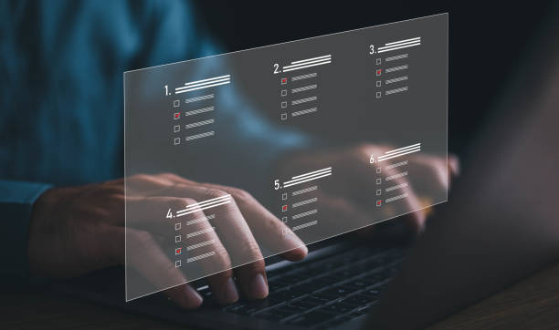 istock Checklist concept, Businessman working on laptop computer checklist and filling survey form online file, Online survey and question, Document Management Checklist quality certificate. 1733767208