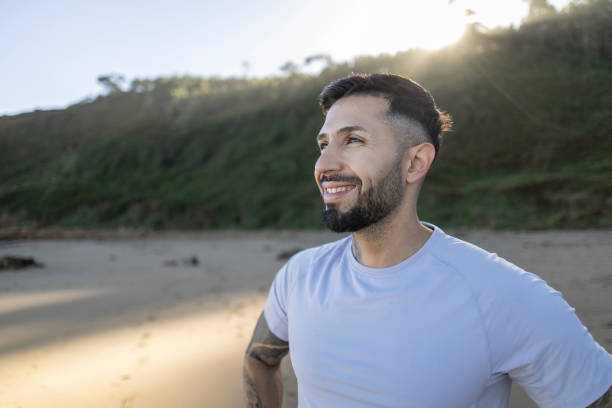 istock Hispanic man does sports at sunrise smiling 1733767263