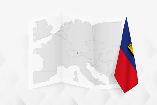 Vector illustration of A grayscale map of Liechtenstein with a hanging Liechtenstein flag on one side. Vector map for many types of news.
