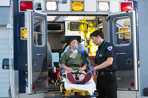 istock Paramedic with child on stretcher 173378366