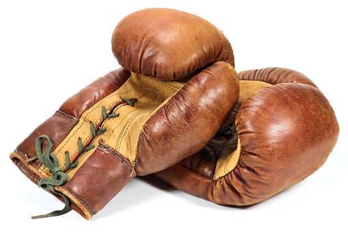 vintage boxing gloves isolated on white background