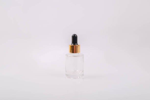 istock Clear glass bottle for facial serum. 1733834623