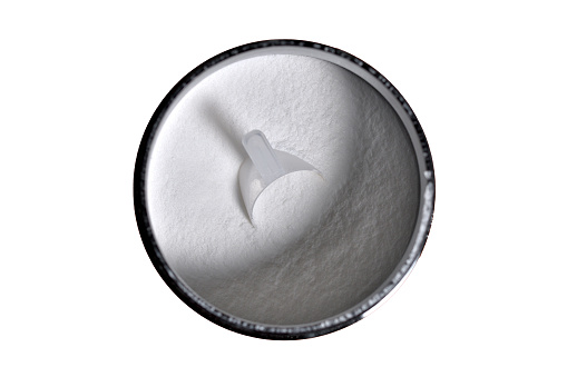 Top view of BCAA powder with spoon