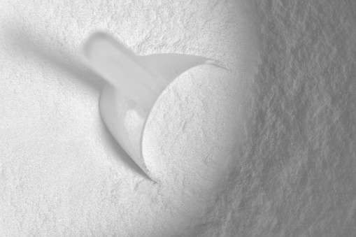 Top view of BCAA powder with spoon