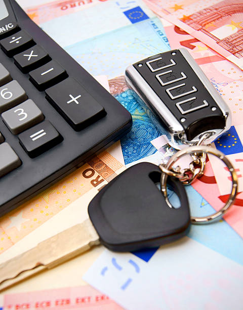 istock Calculators and keys for euro banknotes. 173390295