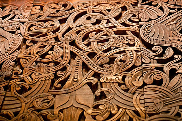 A pattern of norse wooden carvings.