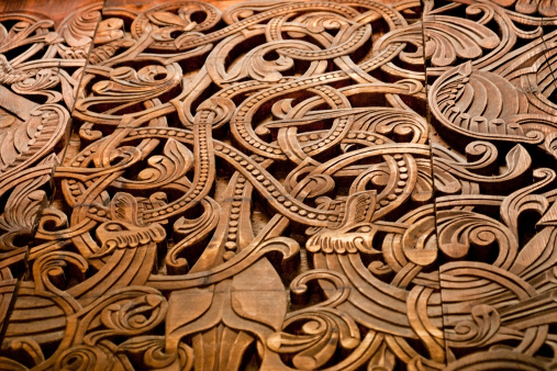 A pattern of norse wooden carvings.