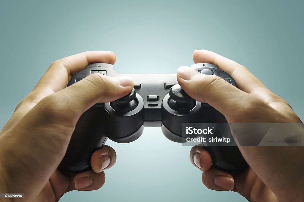 Jogo de vídeo game com um controlador - Foto de stock de Videogame royalty-free