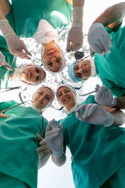 istock Team of nurses and surgeons in surgery. 1733909215