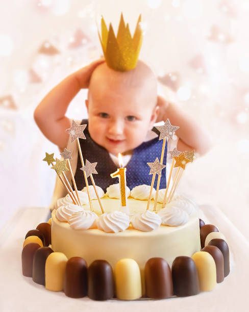istock Happy cute kid (1-year-old) with delicious birthday cake. 1733950584