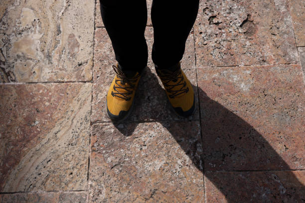 Feet standing on the ground