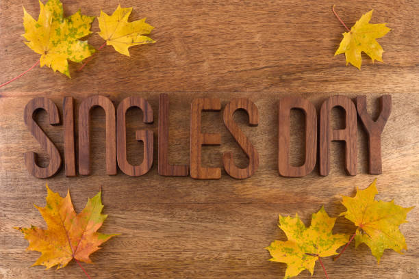 istock 11.11 single's day concept. Letters on wooden background 1733973388