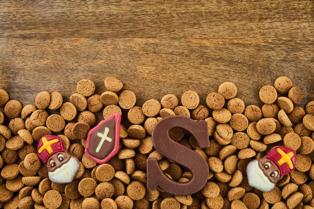 istock Dutch holiday Sinterklaas background with traditional sweets and chocolate letter. 1733974443