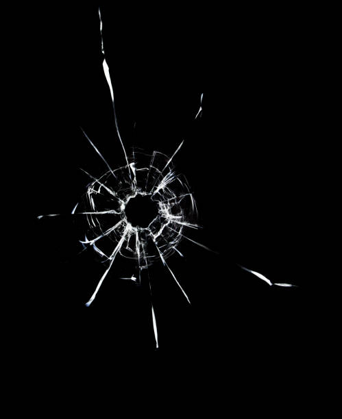 istock Cracked texture of broken glass on a black background. 1733989806