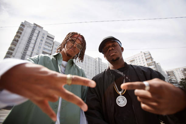 istock Focus on two young African American male rappers looking at camera 1734009049