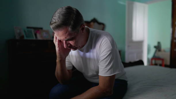 istock Anxious preoccupied older man sits by bedside feeling worry. Stressed desperate middle-aged person feeling suffering from mental illness 1734011202