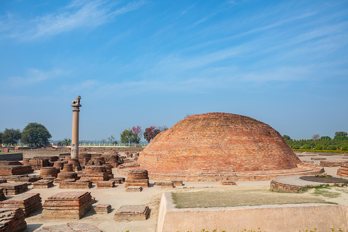 Asokan Pillar And Ananda Stupa At Kutagarasala Vihara in Bihar India.