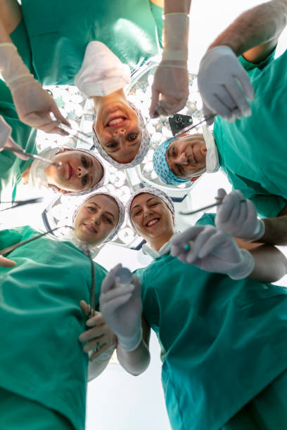 istock Team of nurses and surgeons in surgery. 1734017217