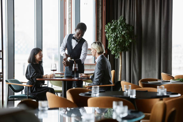 istock Couple enjoying dinner date in restaurant 1734020046