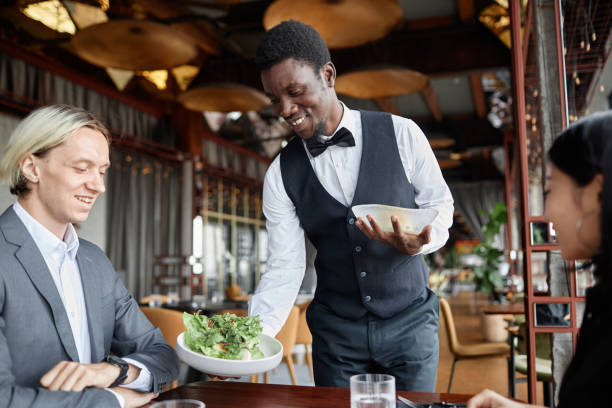 istock Couple enjoying dinner in luxury restaurant 1734020048