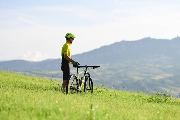 istock cyclist enjoy the beautiful panoramic view. 1734061207