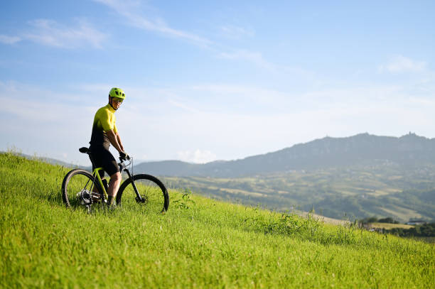 istock Male mountain biker  in a mountain range. 1734061220