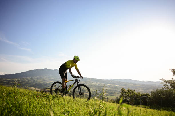 istock Silhouette of a mountain biker enjoying downhill. 1734061774