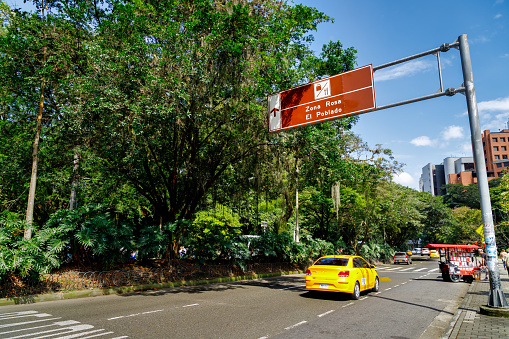 Medellin, Colombia - January 11, 2023: Street sign indicating Zona Rosa and El Poblado in Medellin, Colombia