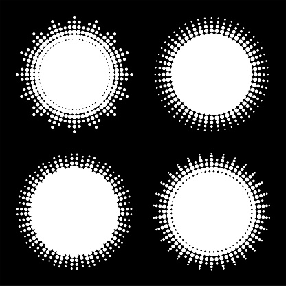 Set of circles for design. Halftone effect. White circles on a black background.