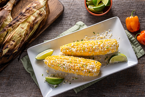 Grilled Mexican Street Corn with Lime, Cotija Cheese, Butter and Habanero Pepper