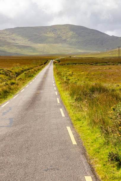 istock Road with Mountains and fields in Dromalonhurt 1734152118