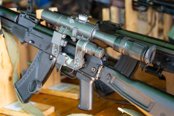 older type, AK-47, Kalashnikov, assault rifle, folding, shoulder, rest, optics,