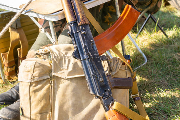 istock Old AK-47 Kalashnikov assault rifle with brown magazine 1734153411