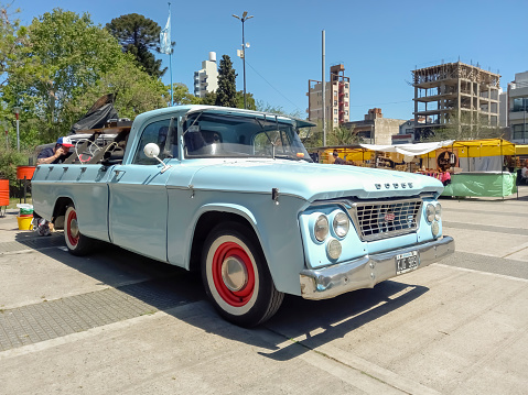 Remedios de Escalada, Argentina - Oct 8, 2023; Old early 1960s Chrysler Dodge D-200 pickup truck in a park. Classic car show