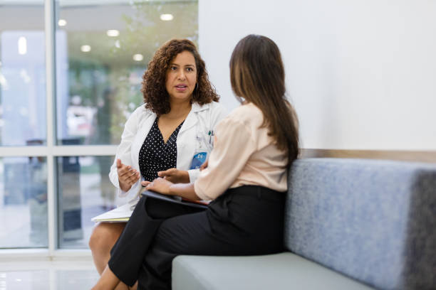istock Female physician sits with the interviewee to ask her questions 1734158883
