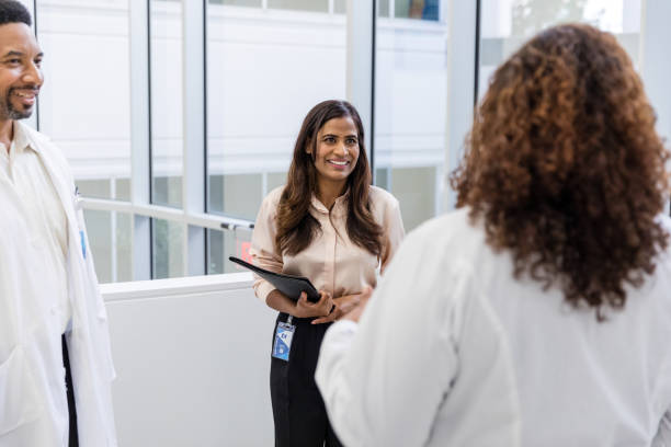 istock Healthcare professionals enjoy conversation with each other 1734158905