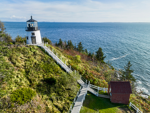 The Owls Head Light is an active aid to navigation located at the entrance of Rockland Harbor on western Penobscot Bay in the town of Owls Head, Knox County, Maine.