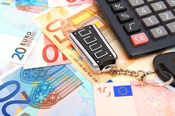 istock Calculator and key from the car 173422345
